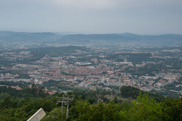 Fototapeta na wymiar Guimaraes city view from Santuario da Penha Sanctuary, in Portugal