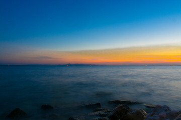 Fototapeta na wymiar Sunset in Athen at the beach of the Mediterranean sea