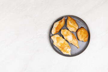 Delicious Chicken Breasts fried and served on the plate