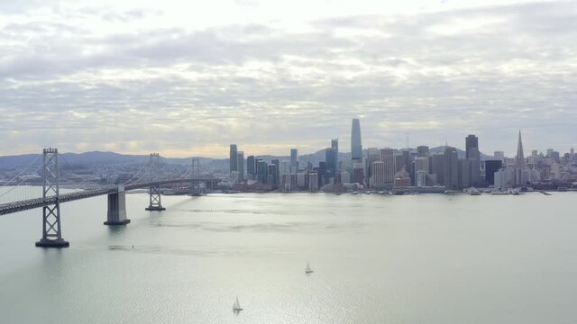 Aerial: boats sailing and view of the city, drone view