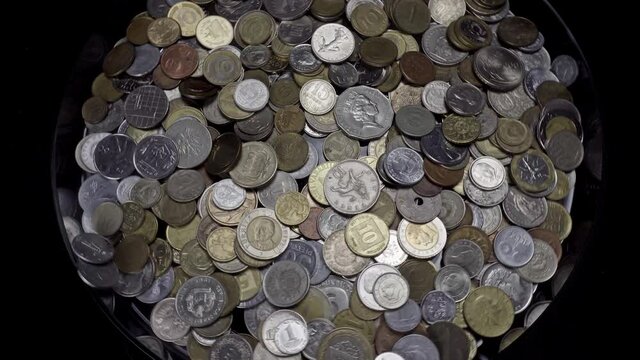 Lots of coins from different countries, some of which no longer exist