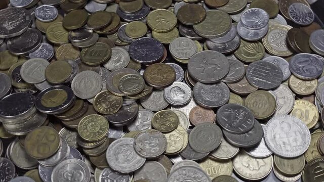 Lots of coins from different countries, some of which no longer exist