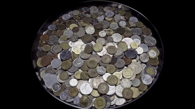 Lots of coins from different countries, some of which no longer exist