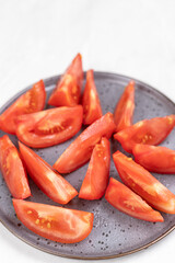 Sliced fresh Tomatoes salad served on the plate