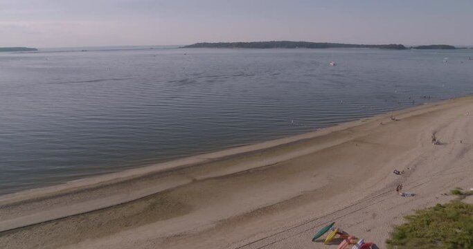 Flying Over Kayaks and Paddle Boards on a Beach Shore in Long Island