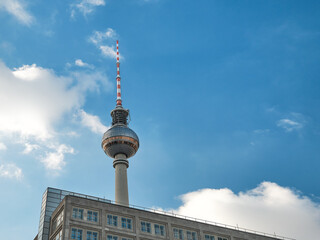 Berlin TV Tower in, Berlin, Germany. Blue sky with clouds.