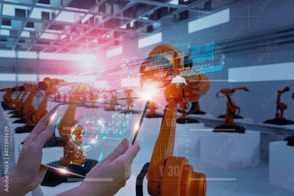 Wall mural industry engineer in factory,using smart tablet glass device,control automated robot arm machine lea
