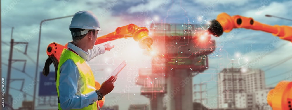 Wall mural industry engineer construction,using smart tablet,control automation robot arm machine intelligence 