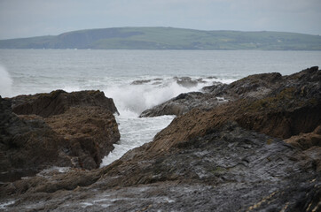 waves crashing on rocks