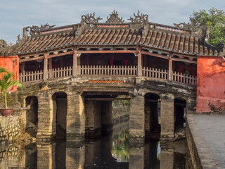 Fototapeta na wymiar Vietnam, Hoi An. Old town historic district (UNESCO World Heritage Site). Japanese Friendship Bridge.