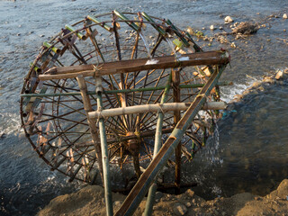 Vietnam, Pu Luong Nature Reserve. Water wheel on the Cham River.