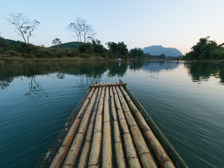 Naklejka premium Vietnam, Pu Luong Nature Reserve. Bamboo raft on the Cham River.