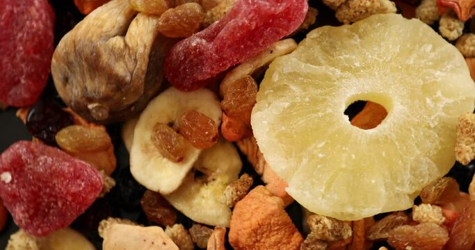 A mix of healthy dried fruits rotating