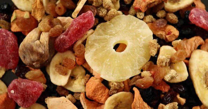 A mix of healthy dried fruits rotating