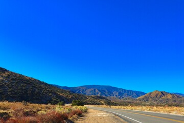 Desert landscape transitioning into California mountains