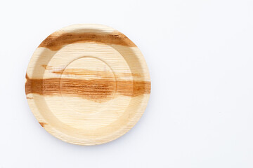 Betel palm leaf plate on white background.