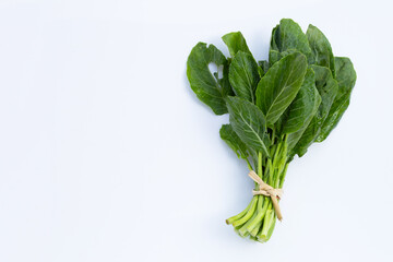 Collard green leaves with holes, eaten by pest. Organic Vegetable