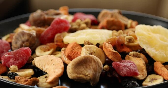 A mix of healthy dried fruits rotating