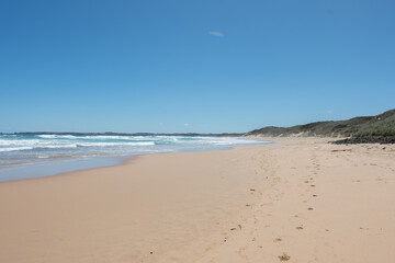 footprints on the beach