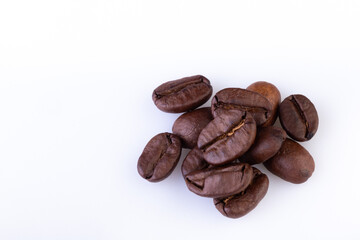 Close up of Arabica Coffee Beans Arranged on a white background