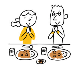 カレーを食べる男性と女性