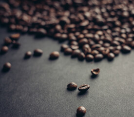roasted coffee beans on a gray background texture Copy Space