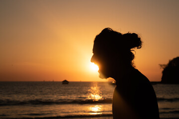 silhouette sunset man screaming