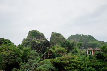 Beautiful green hills covered in cloudy clouds