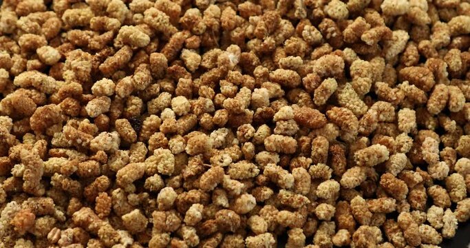 Top wiev of dried mulberry berries close up