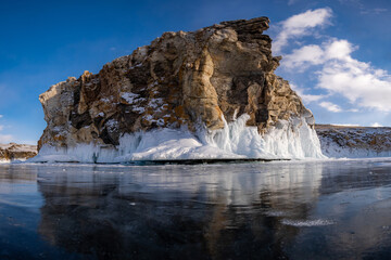 Fototapeta na wymiar Iced rock on the shore of Lake Baikal