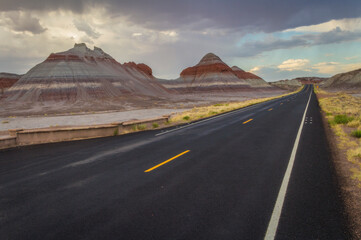 The highway passes through the Painted Desert of Petrified Forest National Park, Arizona