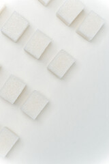 Fototapeta na wymiar sugar cubes glucose ingredient calories energy light background