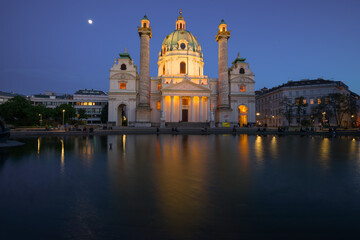 View of the Catholic church Karlskirche (1737) on an April evening. Vienna, Austria