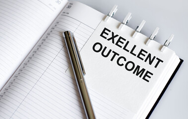 text EXELLENT OUTCOME on the short note texture background with pen