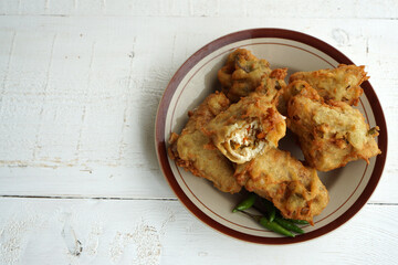 Indonesian traditional snack made from fried tofu and vegetables called `tahu susur`. Stuffed tofu from Indonesia.