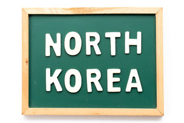 Alphabet letter in word North Korea in blackboard on white background