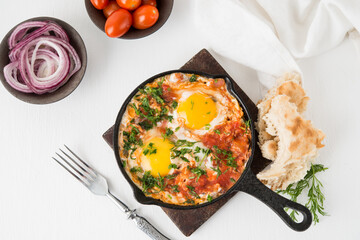 Shakshuka-a traditional Arabic dish made of eggs, peppers and tomatoes