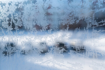 Frost on glass, frozen glass window