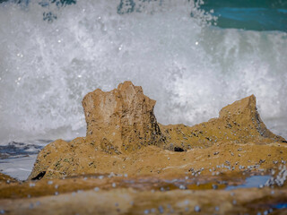 Surf Behind Rock