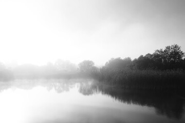 Obraz na płótnie Canvas Fog in the lake. Morning nature water white fog.