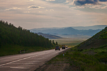 The road across the pass at the end of a summer day