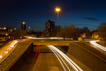 Naklejka na ściany i meble Coventry ring road traffic jam at night with light trails