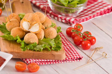 Fried mozzarella cheese balls. 