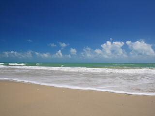 Beautiful tropical sea and sand beach with blue sky in sunny day