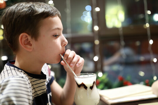 Boy drinking milk shake