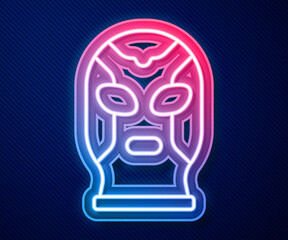 Glowing neon line Mexican wrestler icon isolated on blue background. Vector.