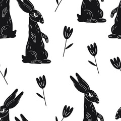 Seamless vector pattern with hand drawn rabbits. Linocut style