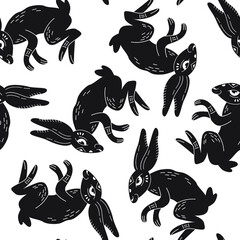 Seamless vector pattern with hand drawn rabbits. Linocut style