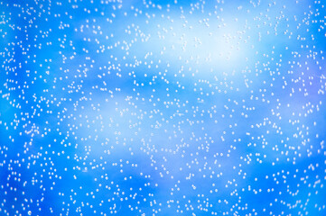 blue background, white dots, shiny