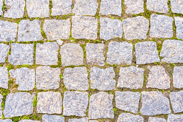 Granite paving stones on a walkway as a natural background